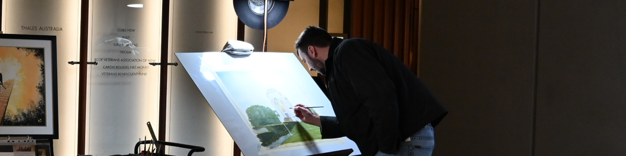 Hugh painting in the Hall of Service