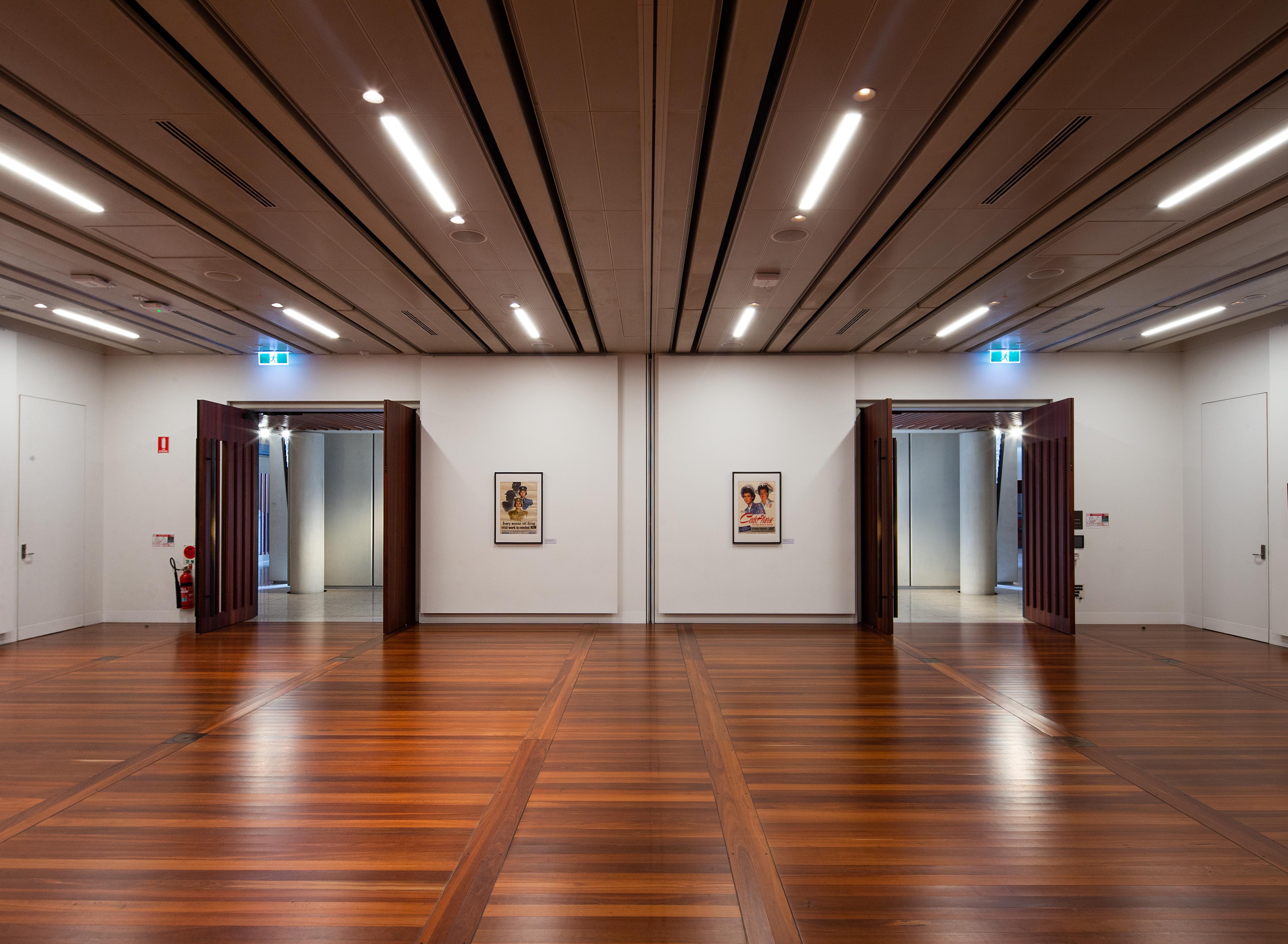 Interior view of the Anzac Memorial Auditorium. Partition divider at the end for dividing the space into two smaller rooms.