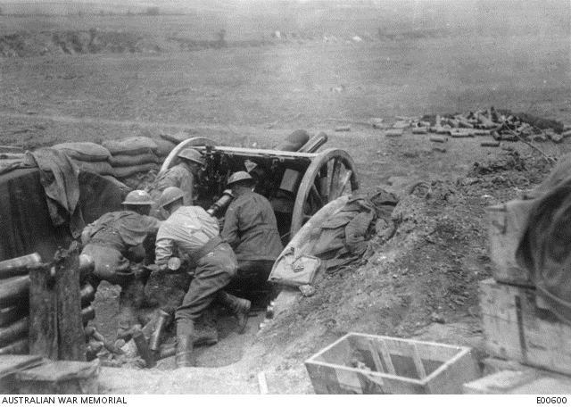 Australian artillerymen at Noreuil firing their 18-pounder field gun in support  of the attack of Second Bullecourt on 3 May 1917. Courtesy AWM
