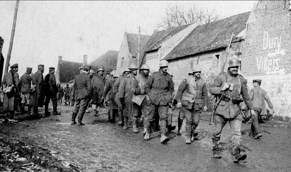 Australian prisoners being marched through a French town behind the lines after the Second Battle of Bullecourt in May 1917.  In this battle The Australians suffered 3,000 casualties including 1,170 POW being taken. (Image courtesy SMH 11 April 2017)