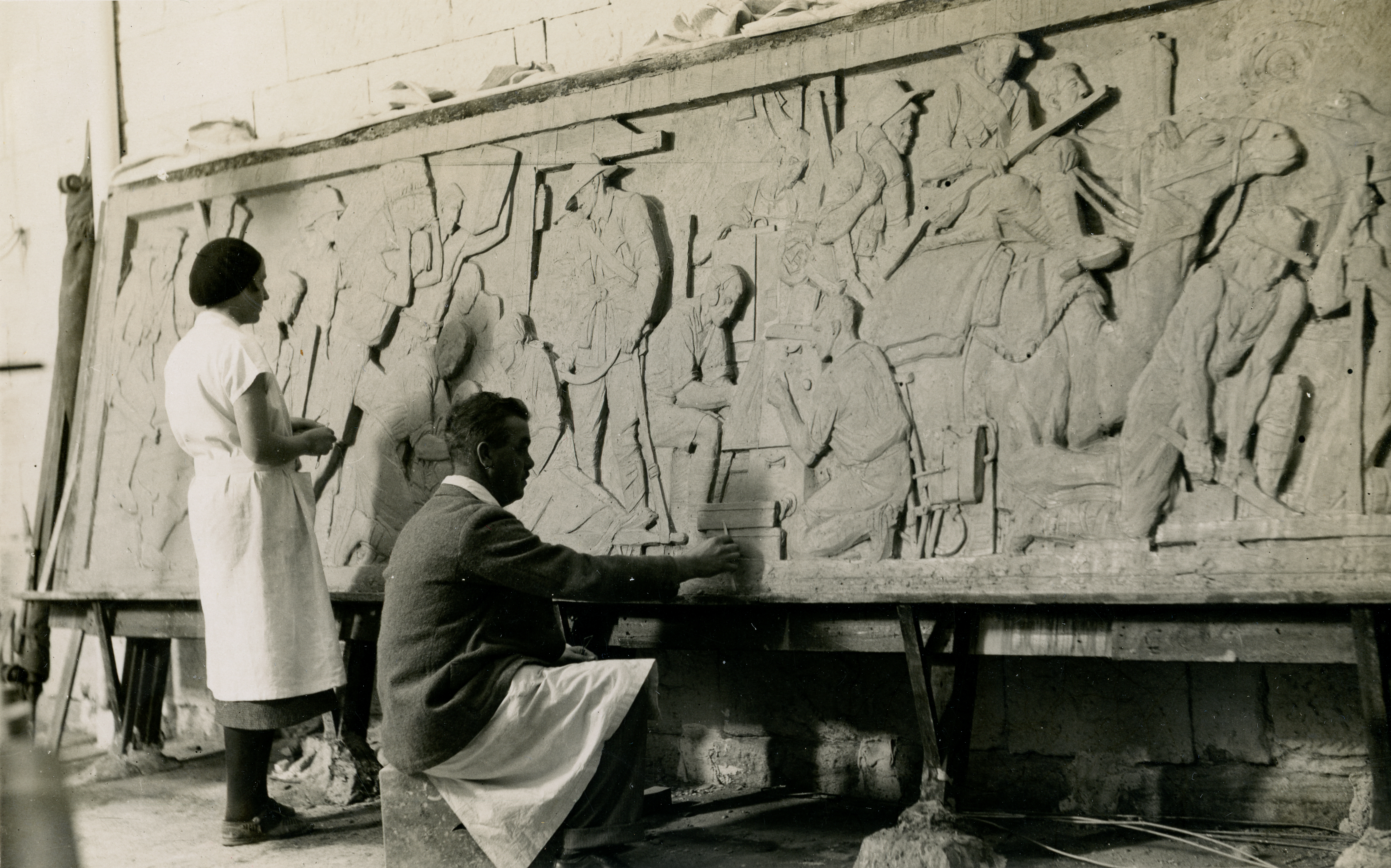 Eileen McGrath and Rayner Hoff working on a relief - courtesy Sylvia Embling archive