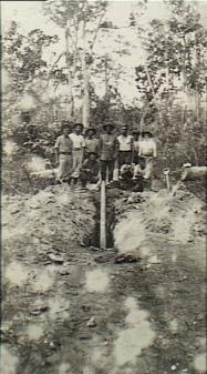Naval landing party personnel shown here digging up a German mine laid to impede progress to the German radio station at Bitapaka in September 1914. Courtesy AWM