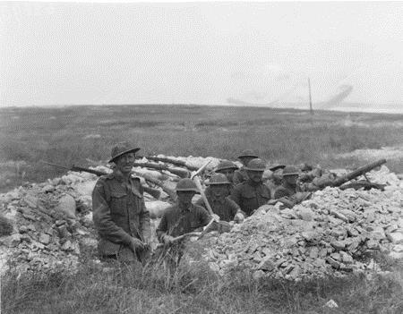 Australian soldiers resting in captured German trenches after the successful  93-minute Battle of Hamel on 4 July 1918. Courtesy AWM