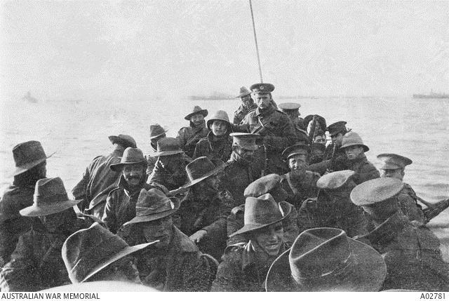 Men of the 1st  Division Signals Company coming ashore at Anzac Cove around 11.00 am on 25 April 1915. Note the variety of headgear: slouch hats, field caps and pith helmets. Courtesy AWM