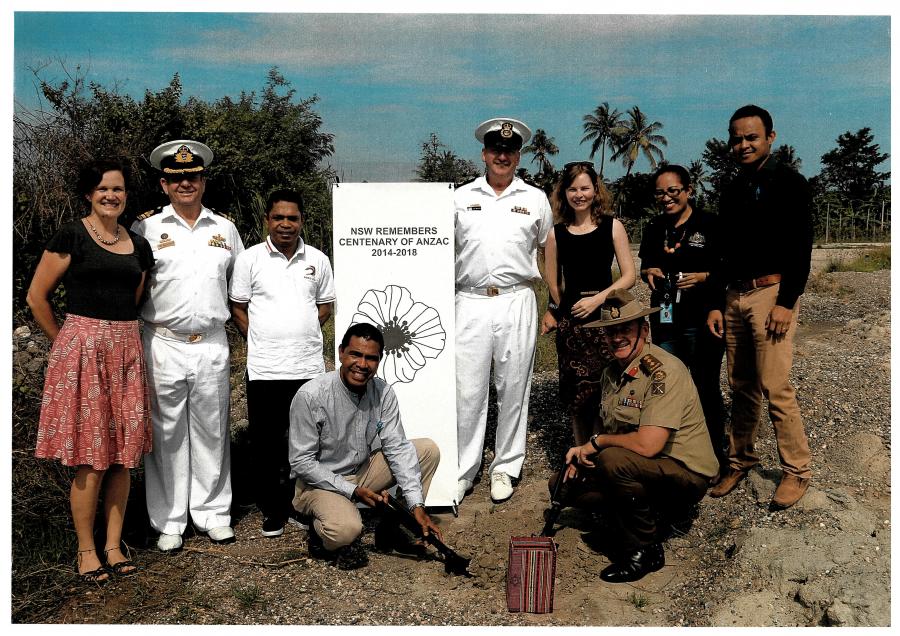 Dignitaries pose with soil collected from the old Dili World War II airfield in Dili, Timor Leste.