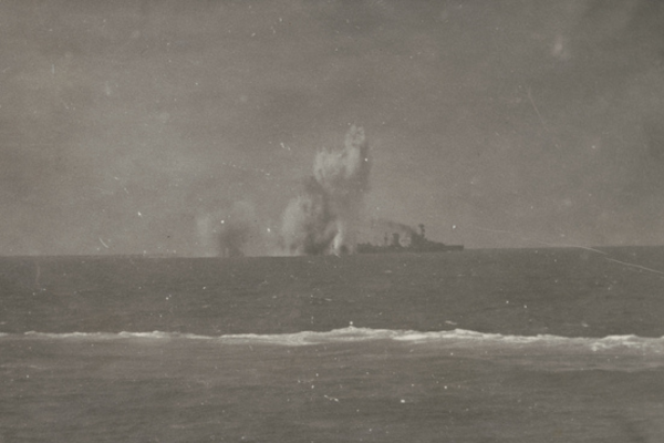 Bombs from a Japanese aircraft falling around the Netherlands Cruiser JAVA during the Battle of the Java Sea. AWM 305183