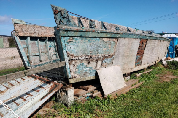 The rotting remains of an original US built LCVP or ‘Higgins Boat’ landing craft from D-Day. It is one of less than a dozen and a half surviving examples. Left to deteriorate in the open it is on private property in what was once Maisey Battery, one of the Atlantic Wall defences. (Photograph B Manera 2023)