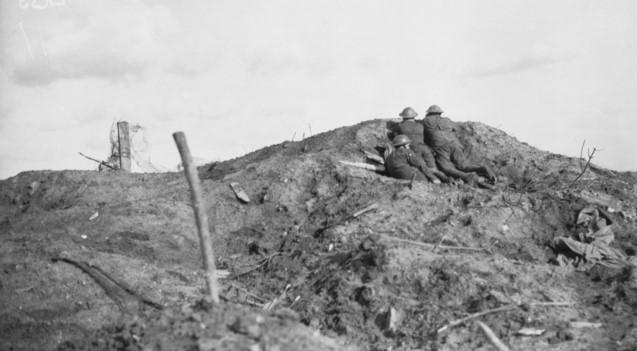 Broodseinde Ridge, Belgium, 5 October 1917. An Observation Post in the Ypres Sector, from which the Australian observers had an excellent view of Becelaere, Keiburg and Passchendaele. This position was captured on 4 October 1917. The men in this photograph are unidentified. AWM E04516.