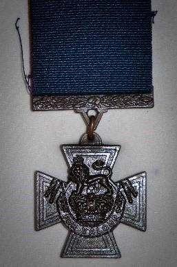 The Victoria Cross on a blue ribbon. Initial awards of Victoria Cross to members the Royal Navy suspended the medal from a blue ribbon while soldiers received their medals on a crimson ribbon. Today all Victoria Crosses are awarded on a crimson ribbon*.