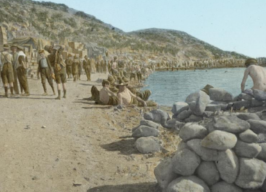 Hand-coloured glass slide depicting soldiers swimming and relaxing by the beach, Gallipoli, 1915. Courtesy of NFSA (100352) 