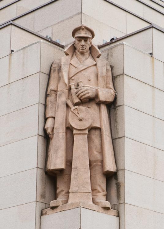 Photograph of the Naval Commander sculpture on the Memorial's facade