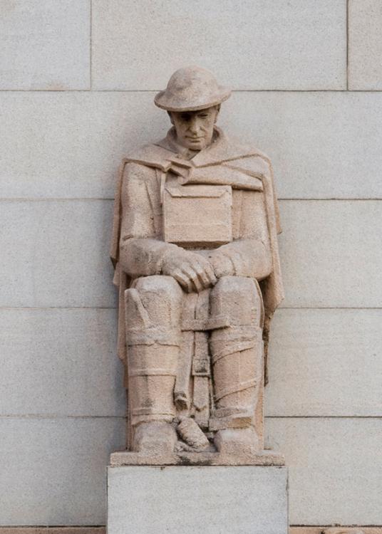 Photograph of the Field Artillery Driver buttress sculpture on the Memorial's facade