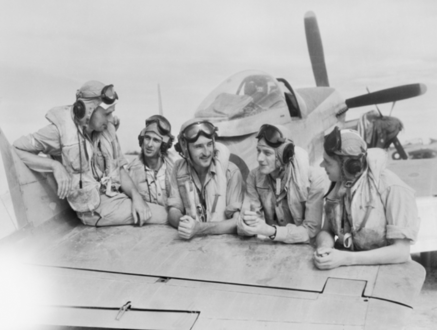 437963 Flight Sergeant Alexander Hunter (left) and his mates during conversion training, Labuan Island, North Borneo, 24 September 1945. Hunter was reported missing, presumed killed just five days after this photograph was taken. AWM OG3619. 