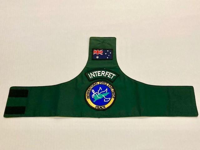 Worn on the upper left shirtsleeve, this brassard was issued to Chief Petty Officer D. Perry, Royal Australian Navy, during his deployment to East Timor aboard HMAS ‘Tobruk’ (II). ‘Tobruk’ sailed for East Timor on 18 September 1999 as part of INTERFET.