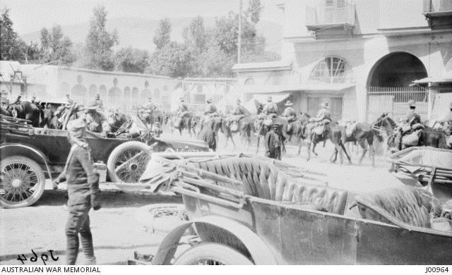 Australian Light Horse units passing through Damascus in Syria after its capture  and surrender on 1 October 1918. Courtesy AWM