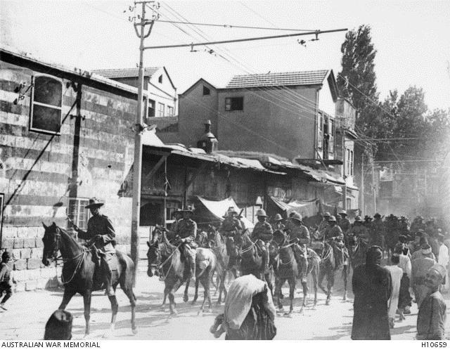 Lieutenant General Harry Chauvel leading men of the Desert Mounted Corps through the streets of Damascus after its capture on 1 October 1918. Courtesy AWM