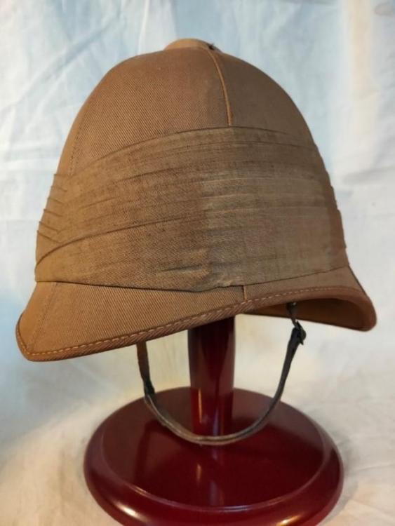 British Foreign Service Helmet, c. 1880. Khaki cloth covered helmets, made of cork pith, were worn by Lt Walter Olivey and the men of the 66th at the Battle of Maiwand. Brad Manera Collection