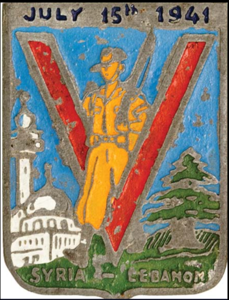 This commemorative badge depicts a slouch-hat-wearing Australian soldier in the centre of a V for Victory between symbols of a Lebanese mosque and a cedar. '15 July 1941' marking the first day of peace sits at the top of the badge. 