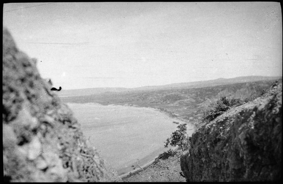 A view of North Beach with the approaches to Hill 60 and the Sari Bair Range visible beyond, photographed above Anzac Cove. Anzac Memorial Collection.