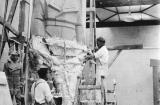 Harry Grounds and John Moorfield making the plaster mould for the air force officer. Courtesy Australian War Memorial