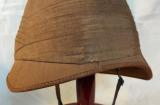 British Foreign Service Helmet, c. 1880. Khaki cloth covered helmets, made of cork pith, were worn by Lt Walter Olivey and the men of the 66th at the Battle of Maiwand. Brad Manera Collection
