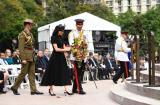 The Duke and Duchess approach the steps of the memorial to lay their wreath