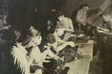 Tailors sew the distinctive blue uniforms to be worn by No. 81 Wing, RAAF, during their service in Japan, Labuan Island, North Borneo, October 1945. AWM OG3612. 