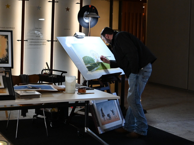 Hugh painting in the Hall of Service